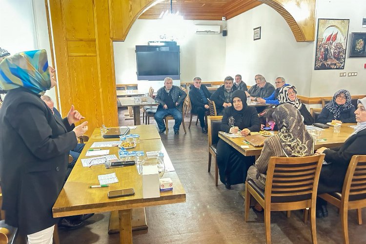 Bursa'da muhtar adayından 'mutlu aile' farkındalığı -