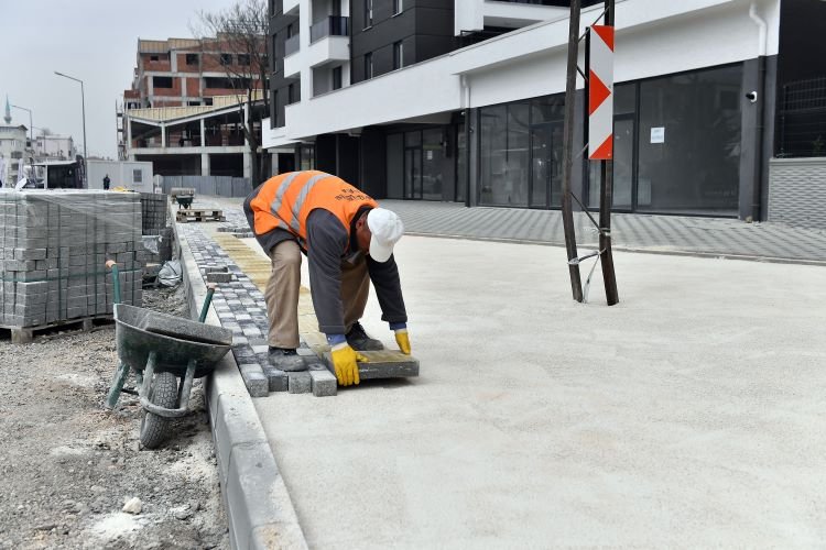 Bursa Osmangazi'de açılan yollarda kaldırım ve asfalt çalışmaları tamamlandı -