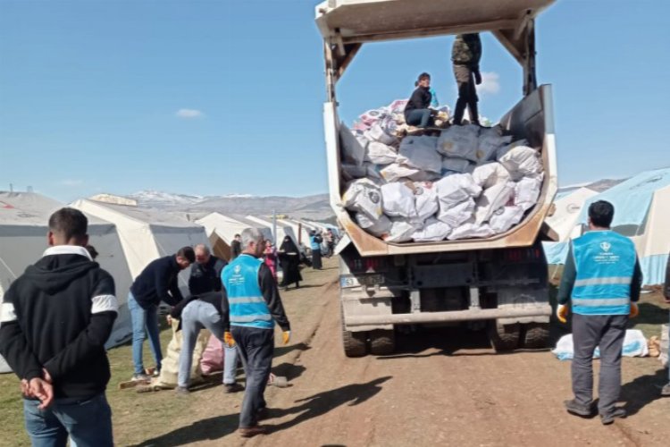 Depremzedelere odun-kömür desteği -
